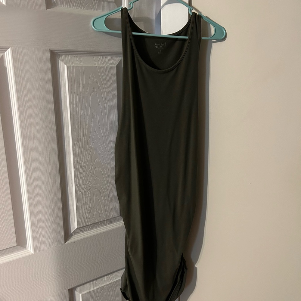 Worn a couple times during pregnancy. Very flexible and comfortable. Size small.